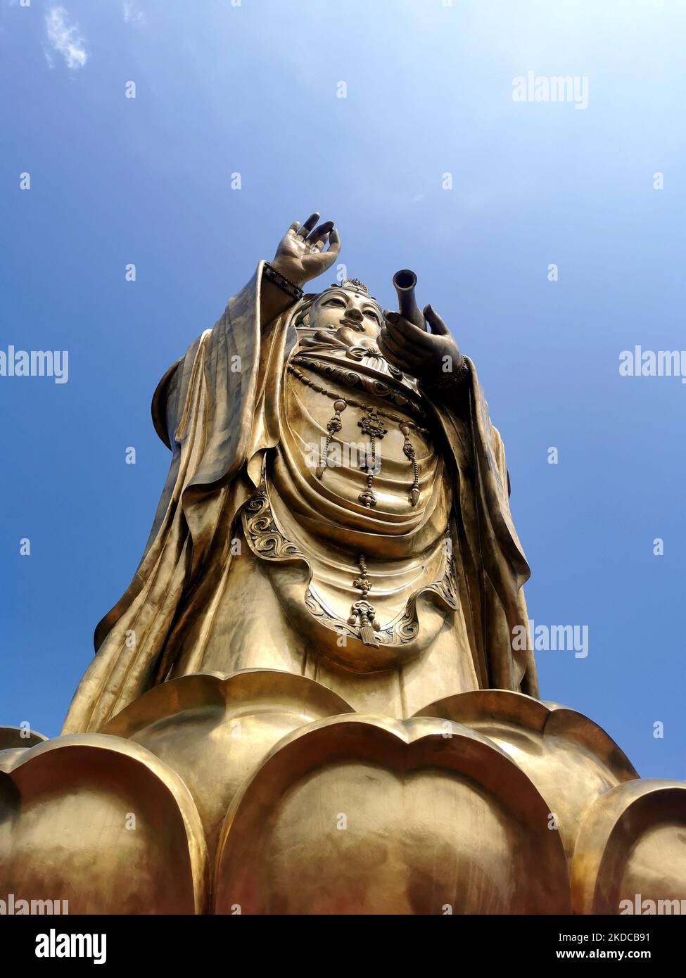 A gold Grand Buddha at Ling Shan which is a sign of attraction Stock