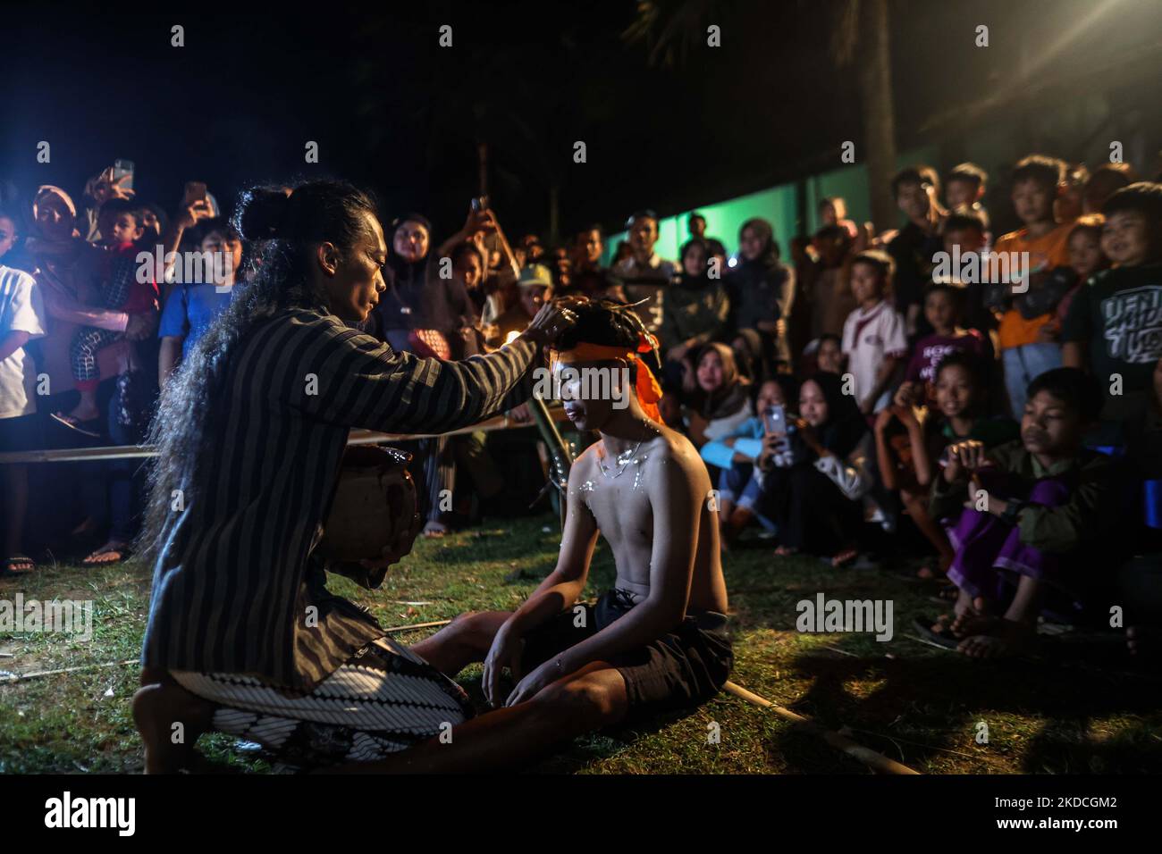 Villagers leaders prepare a ritual prior to playing fire football ...