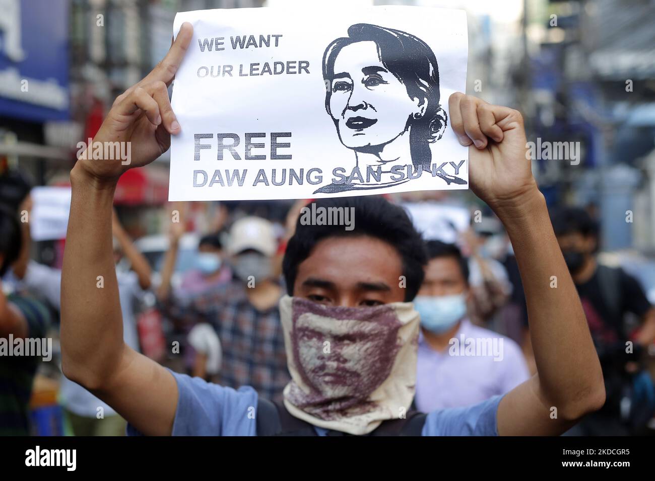 A protester holds a placard with a picture of Aung San Suu Kyi during a demonstration against the military coup in Yangon, Myanmar on February 7, 2021 (reissued June 23, 2022). The junta confirmed today that ousted civilian leader Aung San Suu Kyi had been moved to a prison in Naypyitaw. (Photo by STR/NurPhoto) Stock Photo