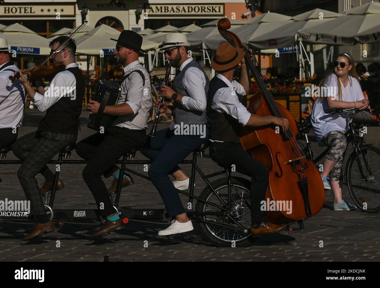 Members of the Big Bike Orchestra, a Polish pop-folk band from Bydgoszcz,  during a performance in Rzeszow's Market Square. On Friday, June 24, 2022,  in Rzeszow, Podkarpackie Voivodeship, Poland. (Photo by Artur