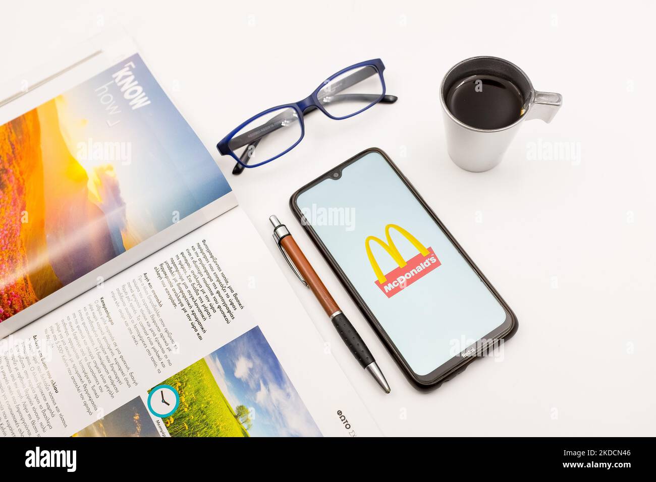 In this photo illustration a McDonald's logo seen displayed on a ...