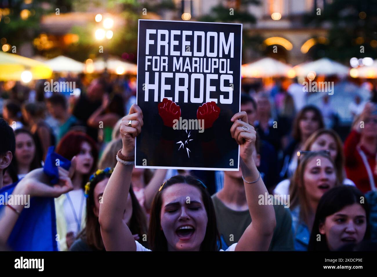 Ukrainians and Poles attend demonstration at the Main Square in support of Azovstal 4308 regiment defenders that are currently in Russian captivity. Krakow, Poland on June 25th, 2022. Peaceful rallies were held around the world in support of more than 2,500 Azovstal prisoners of war. The Azov Regiment was among the Ukrainian units that defended the steelworks in the city of Mariupol for nearly three months before surrendering in May under relentless Russian attacks from the ground, sea and air. (Photo by Beata Zawrzel/NurPhoto) Stock Photo