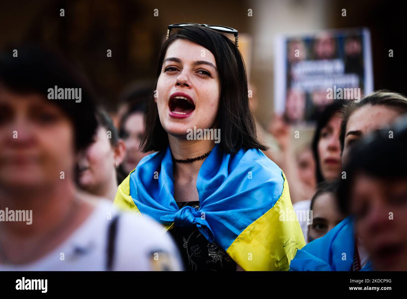 A woman attends a demonstration at the Main Square in support of Azovstal 4308 regiment defenders that are currently in Russian captivity. Krakow, Poland on June 25th, 2022. Peaceful rallies were held around the world in support of more than 2,500 Azovstal prisoners of war. The Azov Regiment was among the Ukrainian units that defended the steelworks in the city of Mariupol for nearly three months before surrendering in May under relentless Russian attacks from the ground, sea and air. (Photo by Beata Zawrzel/NurPhoto) Stock Photo