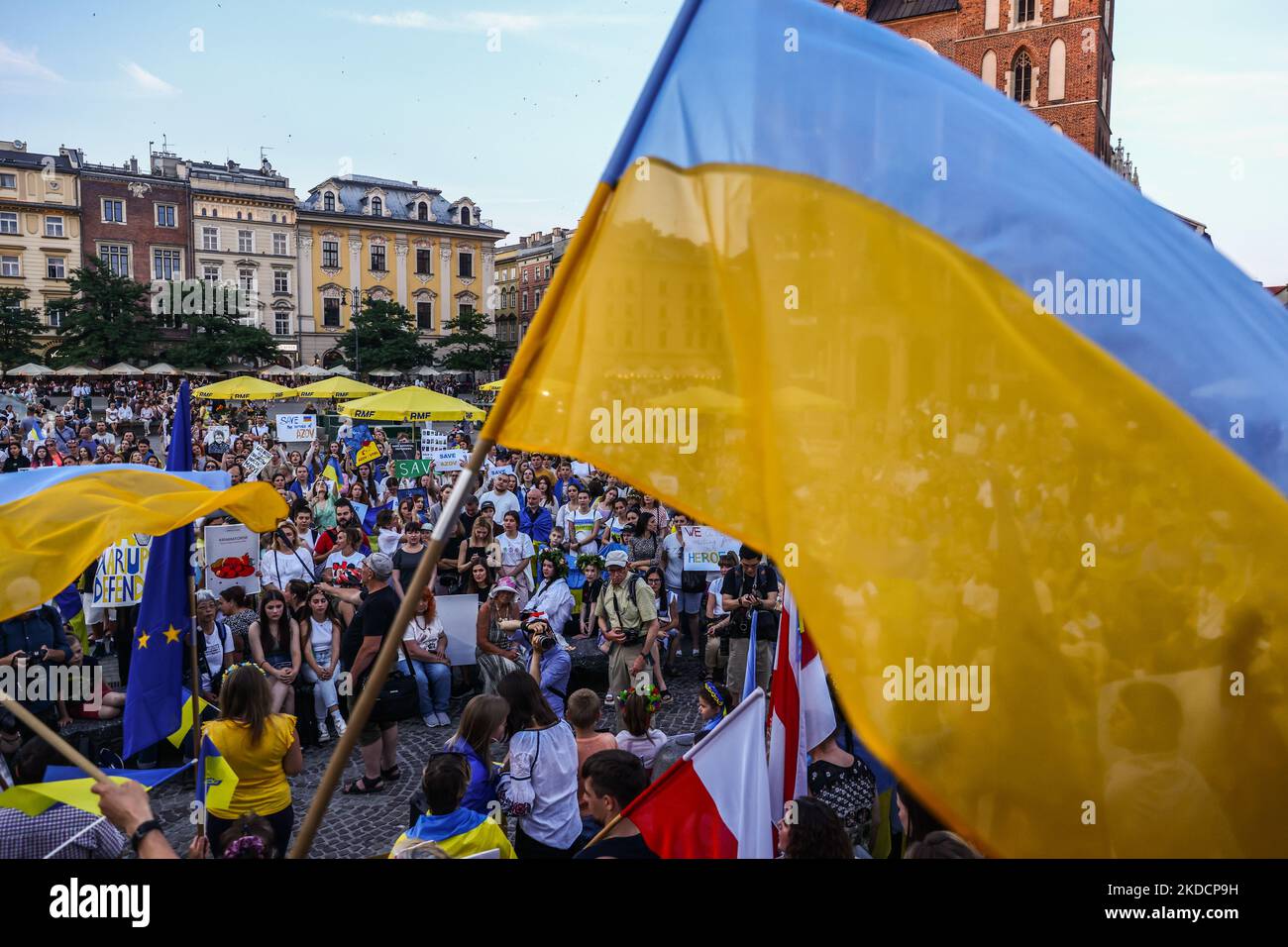 Ukrainians and Poles attend demonstration at the Main Square in support of Azovstal 4308 regiment defenders that are currently in Russian captivity. Krakow, Poland on June 25th, 2022. Peaceful rallies were held around the world in support of more than 2,500 Azovstal prisoners of war. The Azov Regiment was among the Ukrainian units that defended the steelworks in the city of Mariupol for nearly three months before surrendering in May under relentless Russian attacks from the ground, sea and air. (Photo by Beata Zawrzel/NurPhoto) Stock Photo