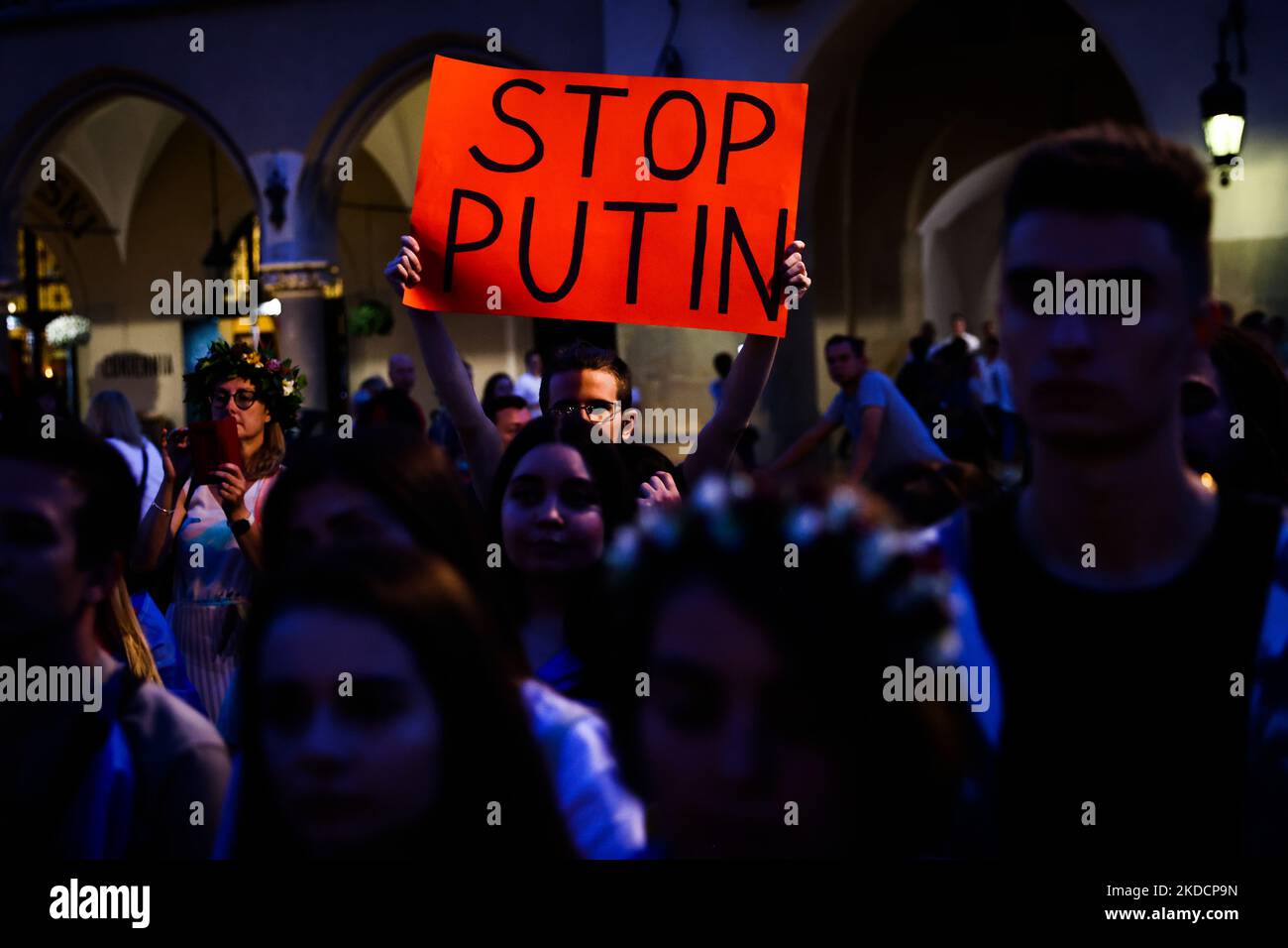 'Stop Putin' banner is seen suring a demonstration at the Main Square in support of Azovstal 4308 regiment defenders that are currently in Russian captivity. Krakow, Poland on June 25th, 2022. Peaceful rallies were held around the world in support of more than 2,500 Azovstal prisoners of war. The Azov Regiment was among the Ukrainian units that defended the steelworks in the city of Mariupol for nearly three months before surrendering in May under relentless Russian attacks from the ground, sea and air. (Photo by Beata Zawrzel/NurPhoto) Stock Photo