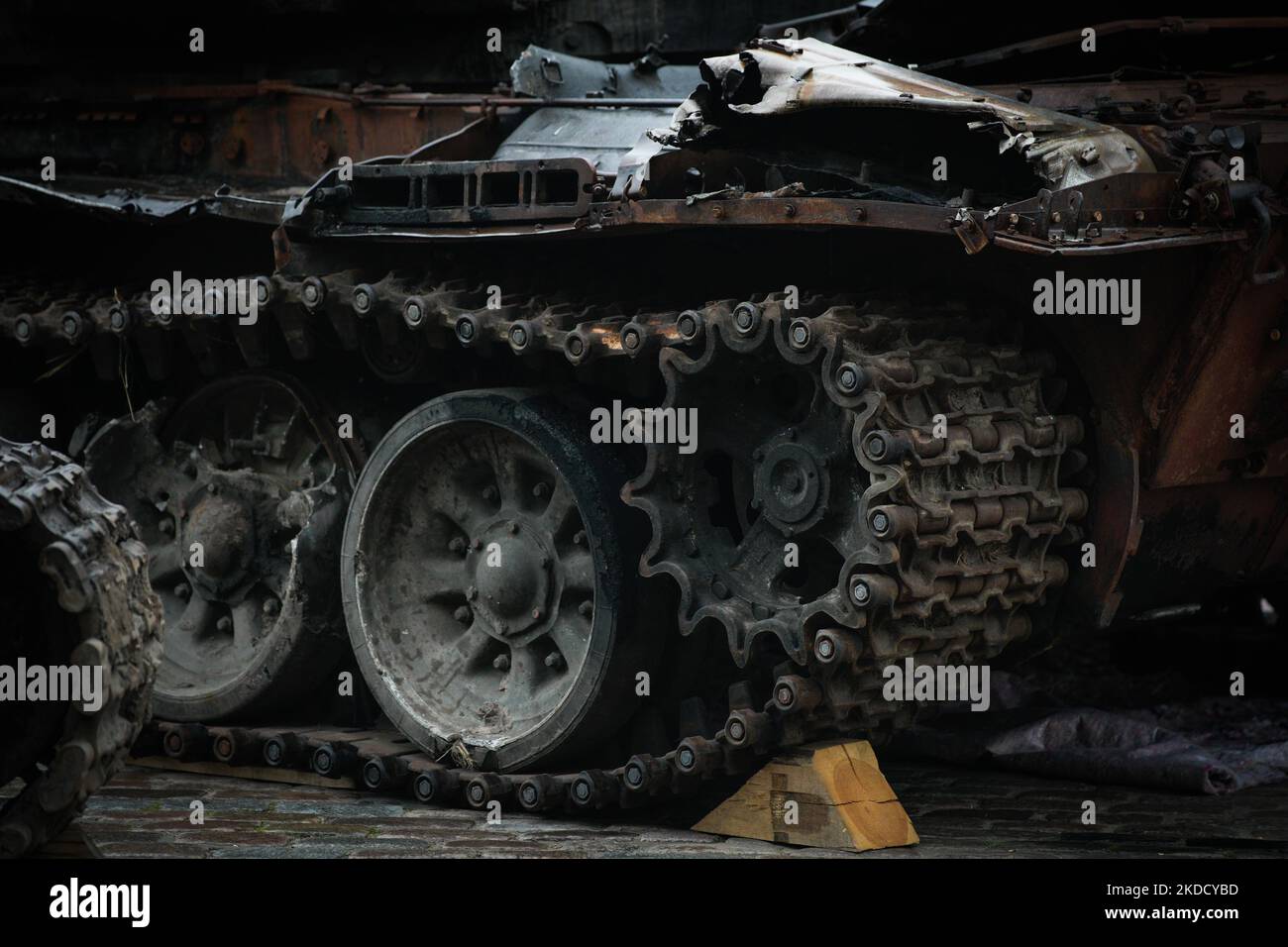 Detail of damage of a Russian tank is seen near the Royal Castle in Warsaw, Poland on 28 June, 2022. Two destroyed Russian army tanks are on display on the Castle Square in the Old Town after having been transported from Ukraine. One of the tanks, a T-72 was destroyed in the Bucha district near Kyiv where in march the Russian army committed mass executions of civilians. The second tank on display is a 2S19 Msta self-propelled Howitzer weighing around 42 thousand kilos. (Photo by STR/NurPhoto) Stock Photo