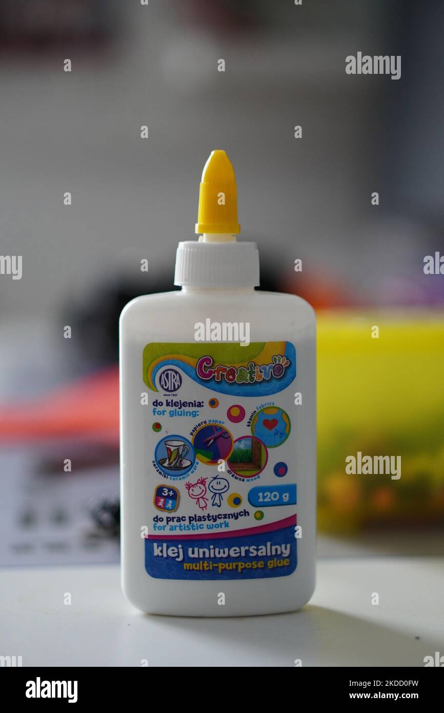 A vertical shot of Universal glue Creativo brand on blur background Stock Photo