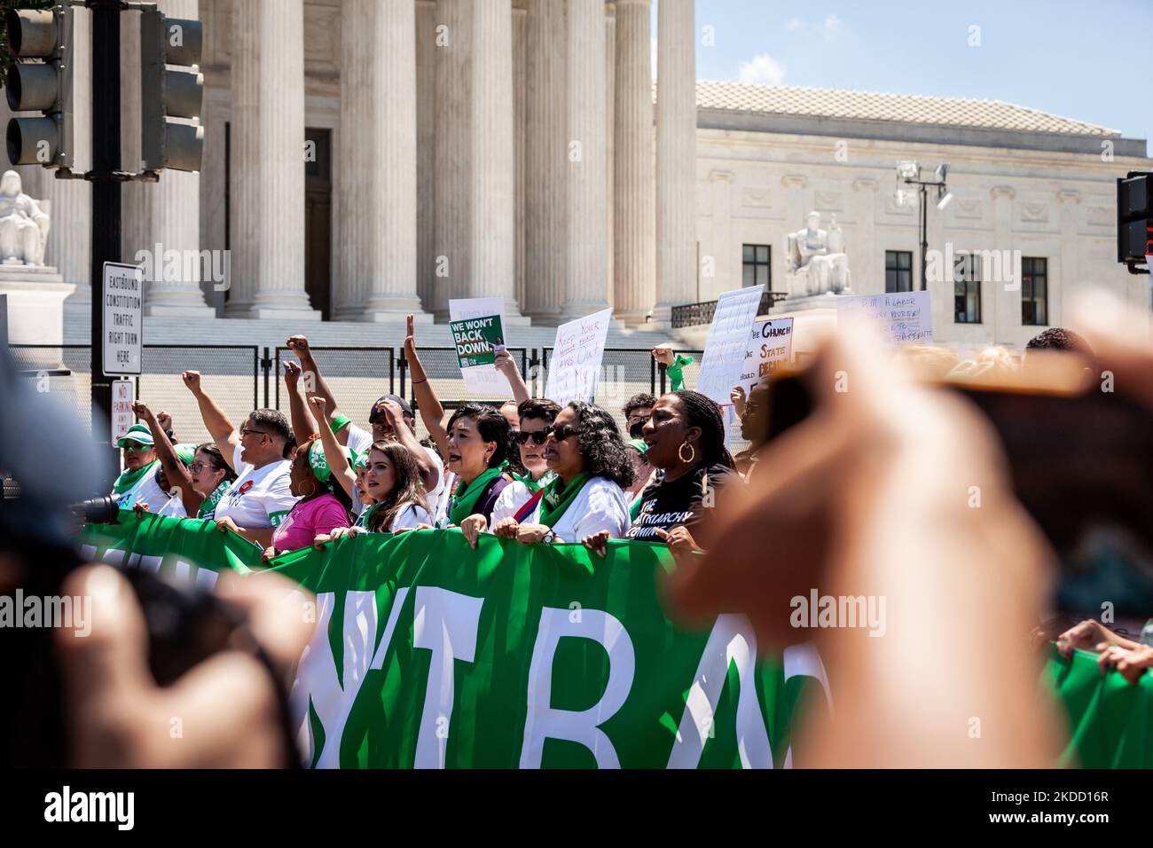 Protesters pas the Supreme Court during a protest and mass civil disobedience action for reproductive rights hosted by the Center for Popular Democracy. The event comes less than a week after the Court issued its opinion in Dobbs v. JWHO, overturning Roe v. Wade and reversing the federal right to abortion access. (Photo by Allison Bailey/NurPhoto) Stock Photo