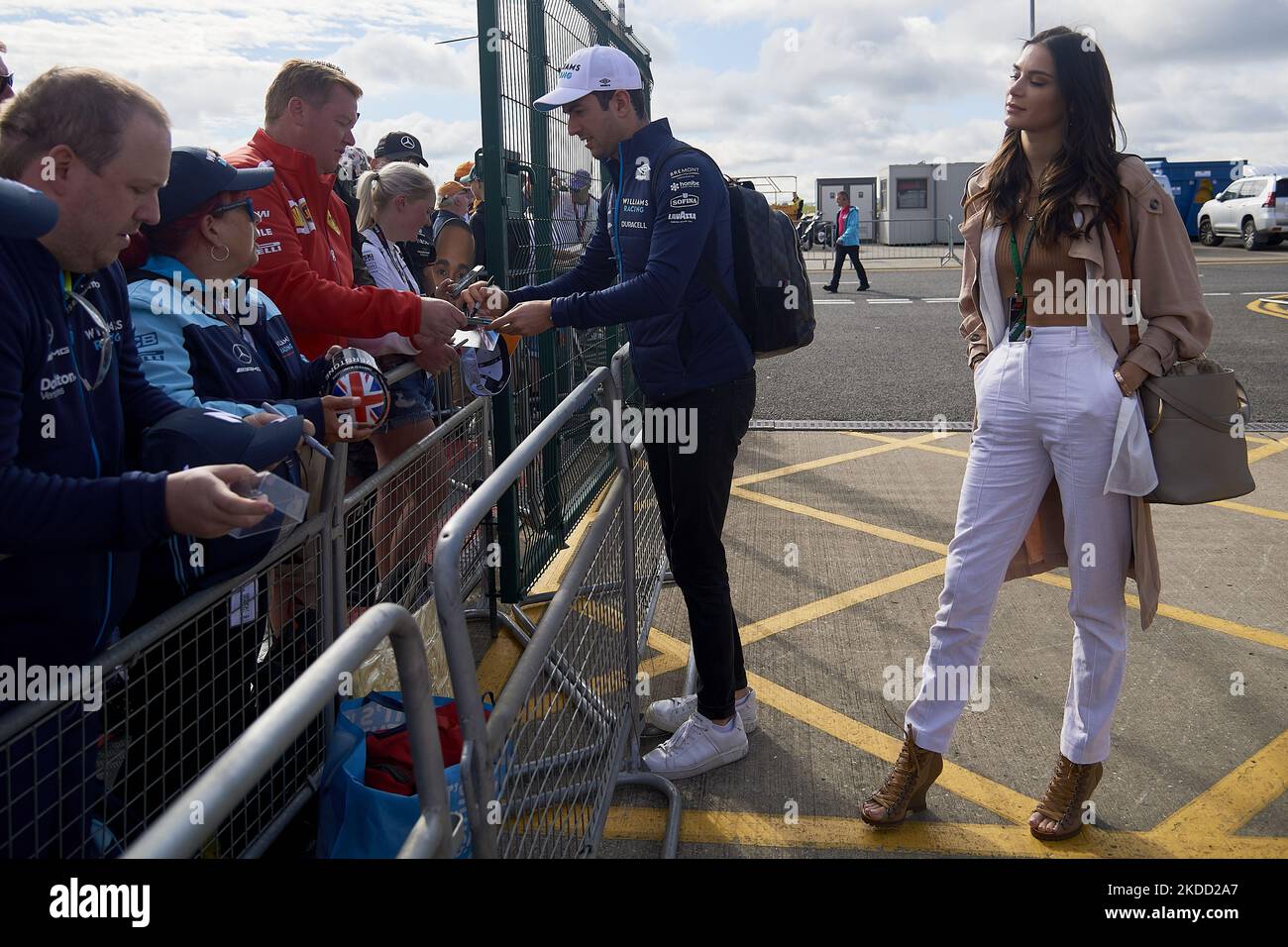 Nicholas Latifi of Canada and Williams with his girlfriend Sandra Dziwiszek prior practice ahead of the F1 Grand Prix of Great Britain at Silverstone on July 1, 2022 in Northampton, United Kingdom. (Photo by Jose Breton/Pics Action/NurPhoto) Stock Photo