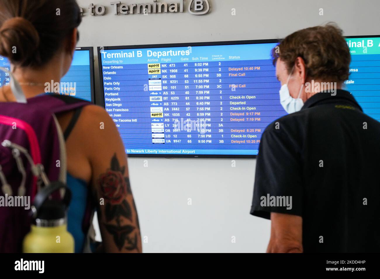 Travelers arrive an air train at Newark Liberty International Airport (EWR) on July 3, 2022 in