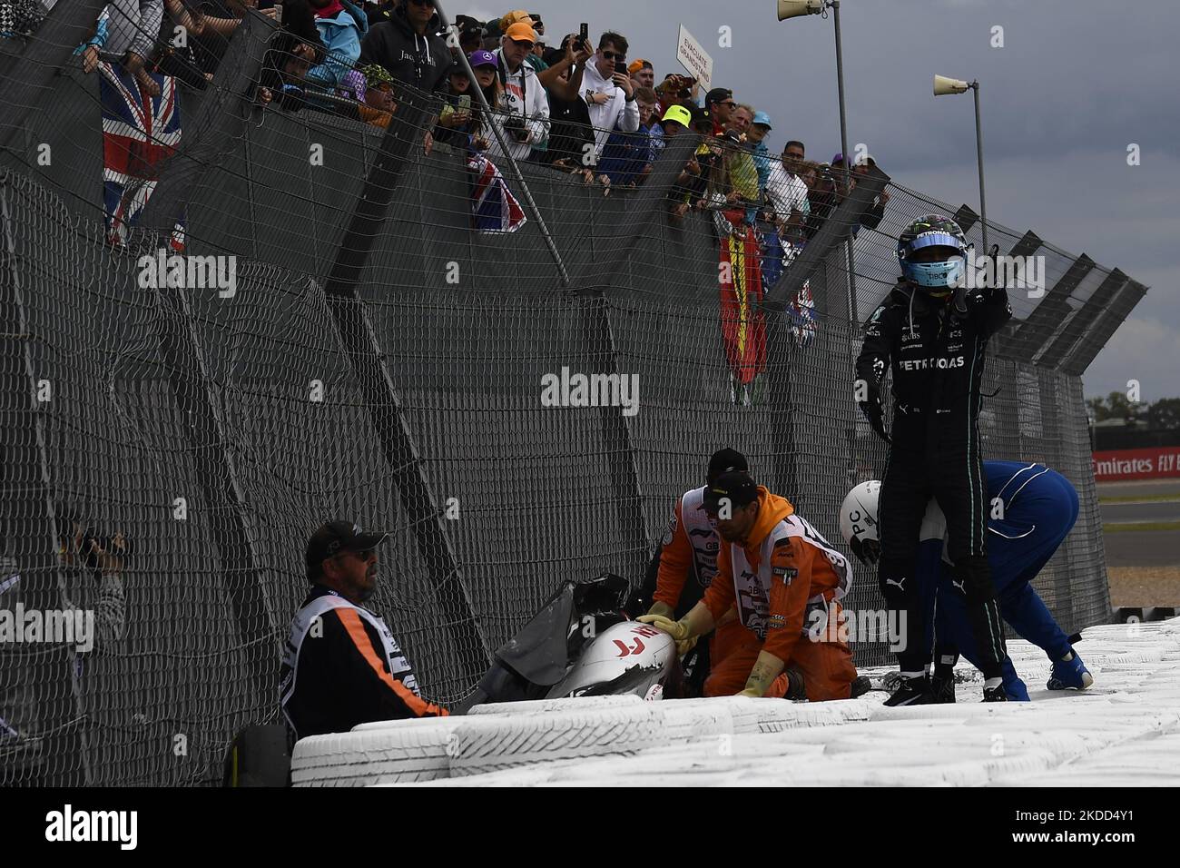 Zhou Guanyu of China Alfa Romeo F1 and George Russell of Great Britain and AMG Petronas F1 crash their cars during the race of the F1 Grand Prix of Great Britain at Silverstone on July 3, 2022 in Northampton, United Kingdom. (Photo by Jose Breton/Pics Action/NurPhoto) Stock Photo