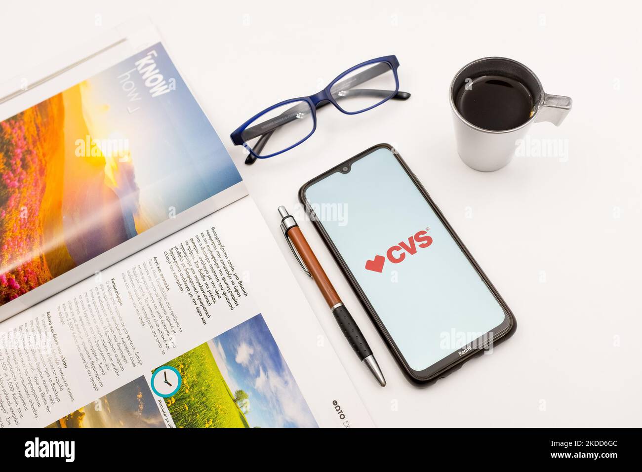 In this photo illustration a CVS Pharmacy logo seen displayed on a ...