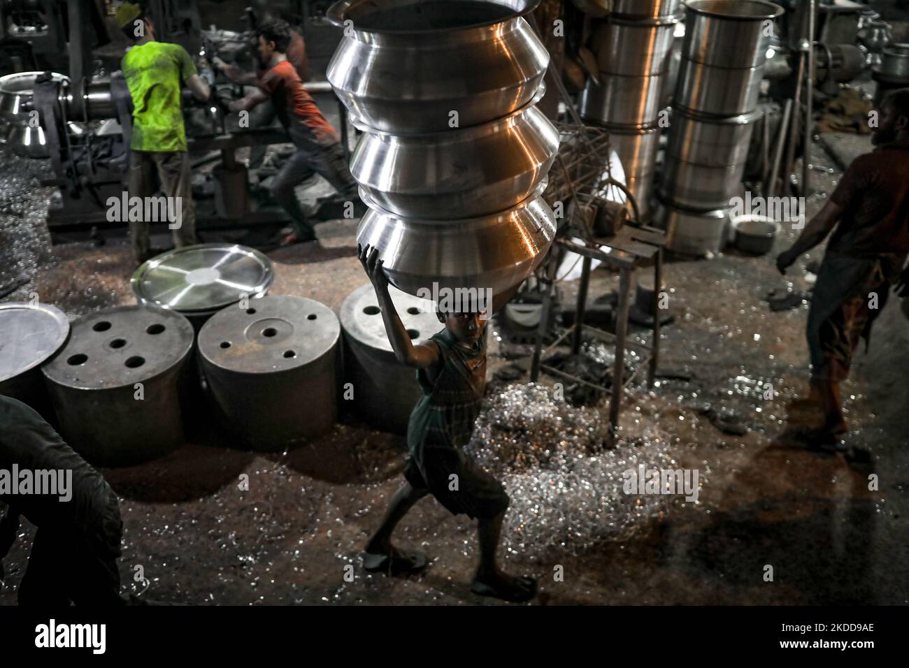 A child works inside a kitchen utensils factory at Shyampur in Dhaka, Bangladesh on July 4, 2022