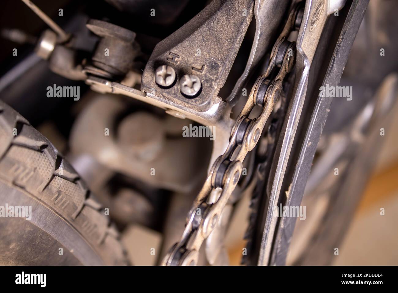 A bicycle chain is a roller chain that transfers power from the pedals