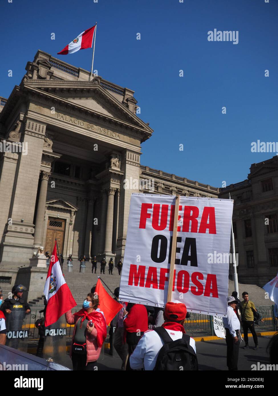 'Get out OAS mafia' can be read on a banner when thousands of people take to the streets, once again, to protest against President Pedro Castillo. Castillo, who is immersed in several investigations for alleged acts of corruption in which his closest entourage would also be involved, has requested the intervention of the OAS in order to support his regime. Stock Photo