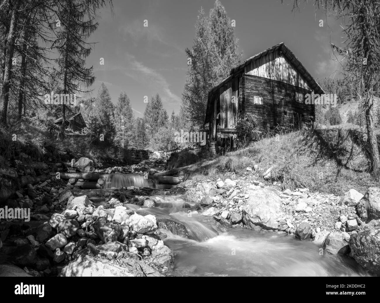An old wooden watermill in Val di Morins, the Dolomite Alps of South