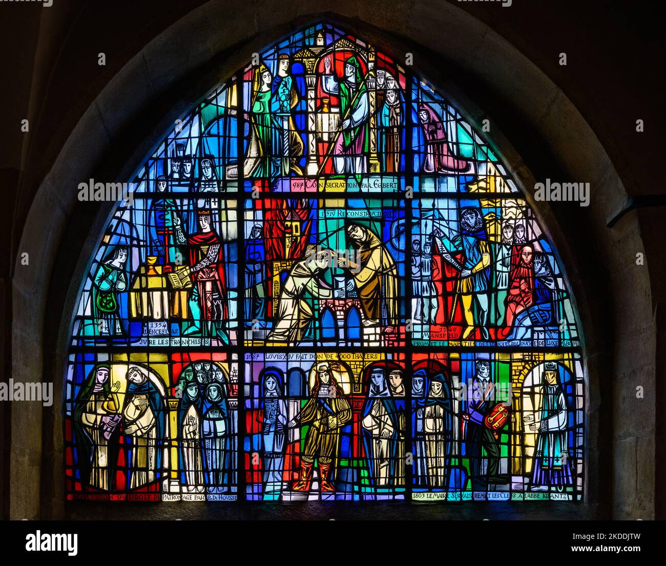 Stained-glass window In Église St. Michel (St. Michael's Church) depicting the history of St Michel's Church. Luxembourg City, Luxembourg. Stock Photo