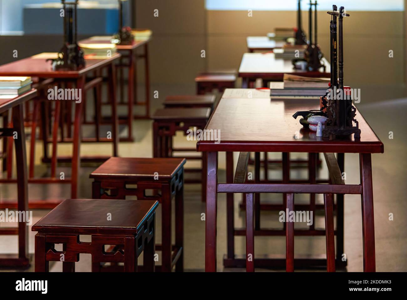 Mahogany tables and chairs, pens, inks, papers and inkstones in traditional Chinese academy Stock Photo