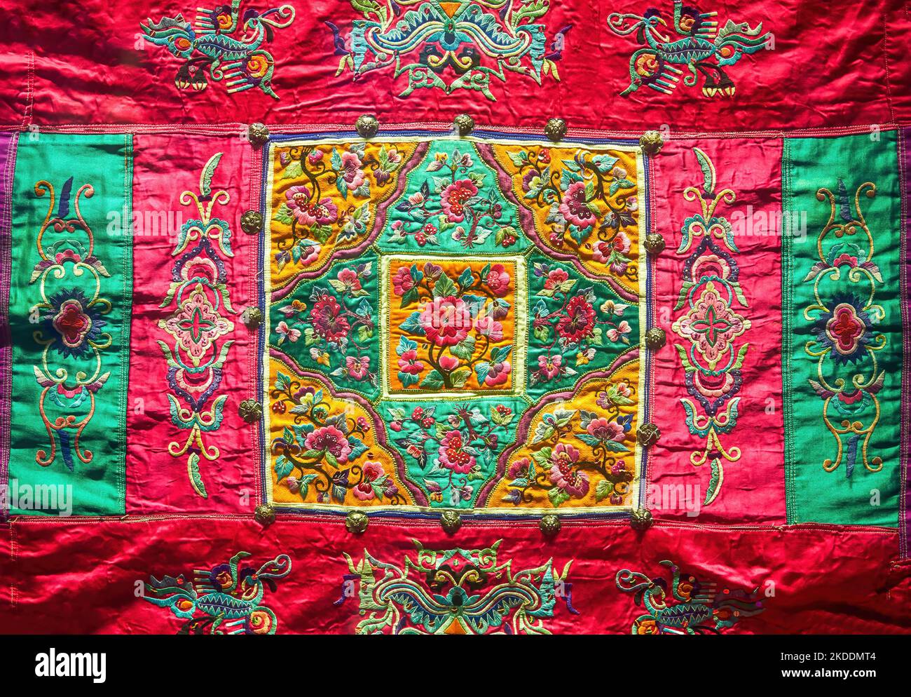 Chinese ethnic patterns embroidered on red cloth Stock Photo