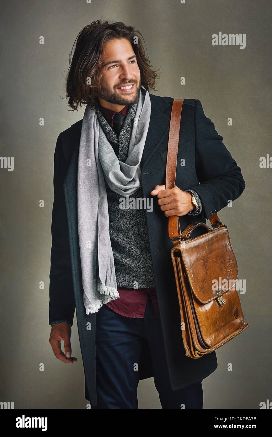 Fashion favors the bold. a stylishly dressed man posing with a leather