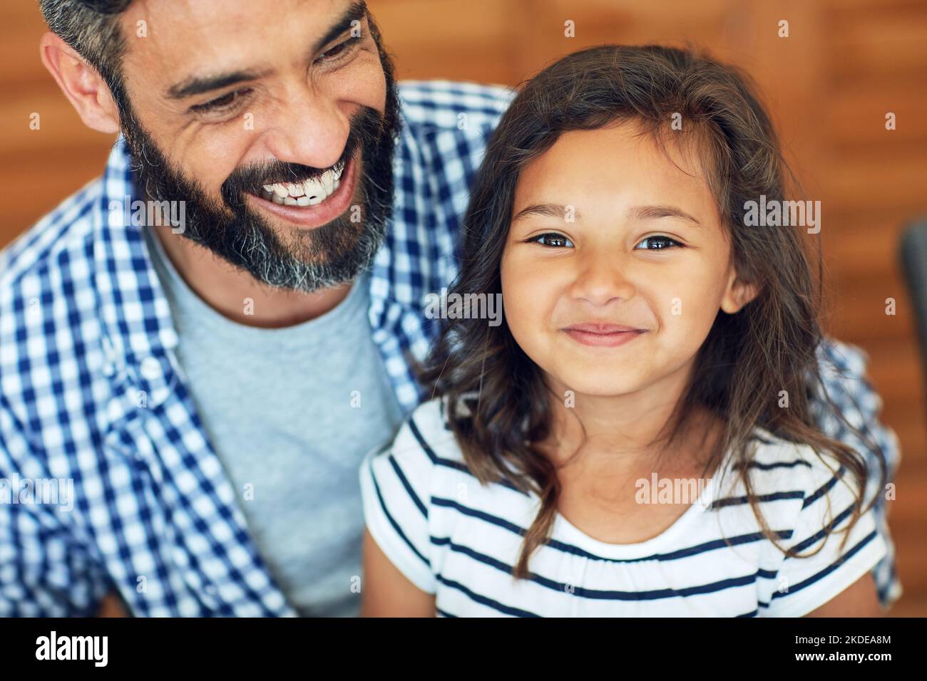 Ive got daddy wrapped around my finger. Portrait of a happy little girl