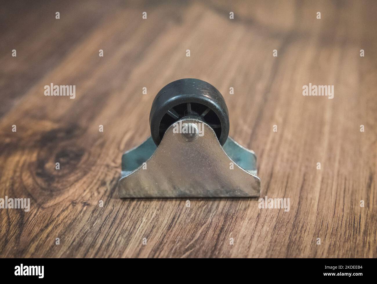 black plastic wheel which will attached to the furniture Stock Photo
