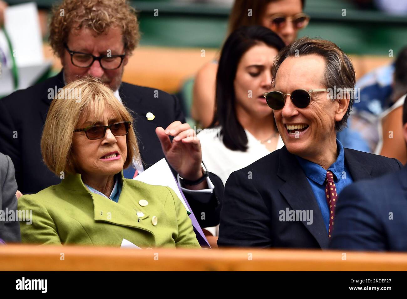 File photo dated 09/07/19 of Richard E. Grant and his wife Joan Washington in the royal box of centre court on day eight of the Wimbledon Championships at the All England Lawn Tennis and Croquet Club, Wimbledon. Richard E Grant has said ignoring the fact that a loved one has died makes it feel like that person's life didn't count, as he described facing the loss of his wife. The Oscar-nominated actor said that the coronavirus lockdown had given him the 'extraordinary gift' of time with his wife, who died in September 2021 after being diagnosed with terminal cancer. Issue date: Sunday November  Stock Photo