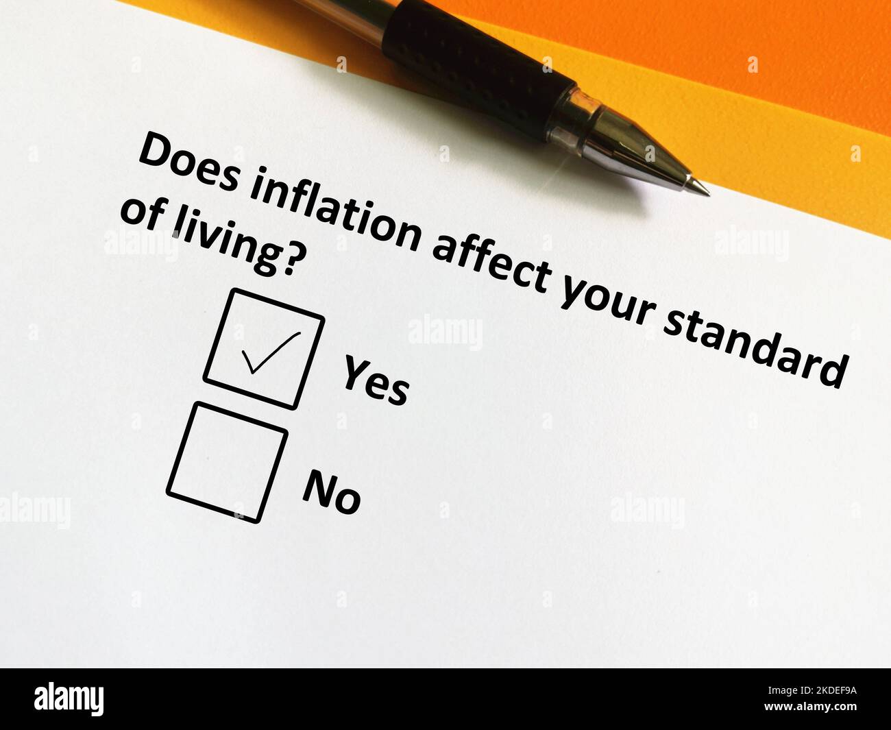 One person is answering question about inflation. He thinks inflation affects his standard of living. Stock Photo