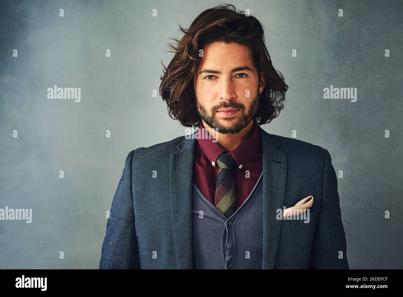 Cool, calm and collected. Studio portrait of a stylishly dressed handsome young man. Stock Photo