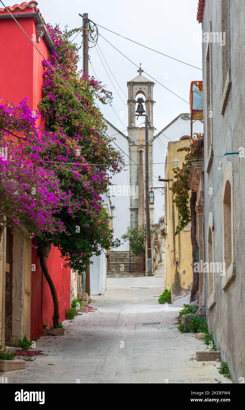 Beautiful alley with colorful buildings in Archanes. Stock Photo