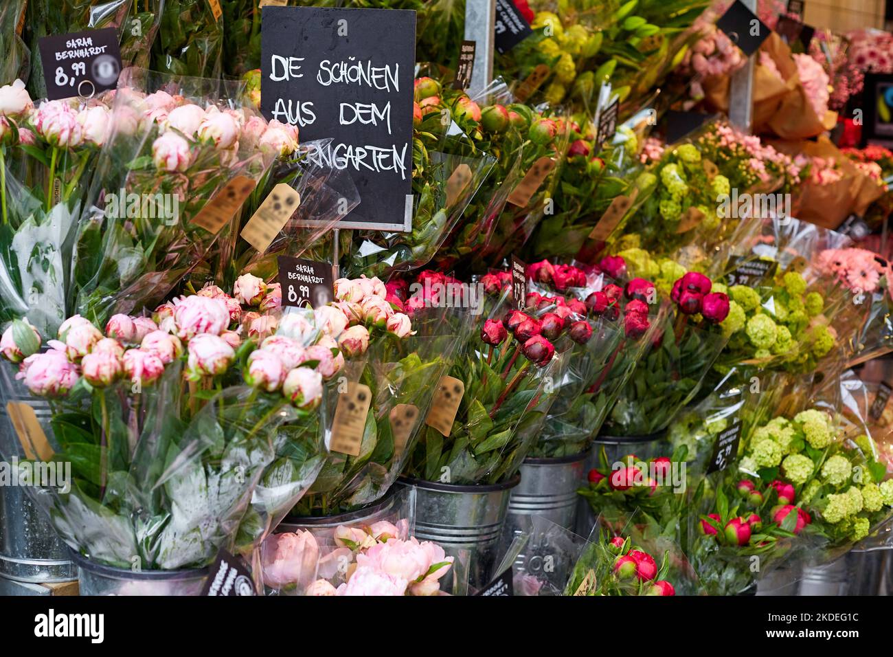 The counter of a flower store in Germany is full of fresh flowers. Stock Photo