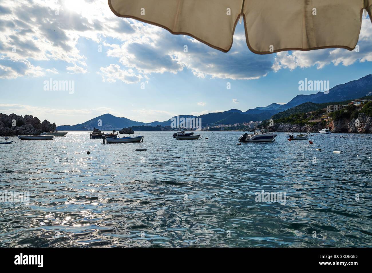 Sea bay with mountains and many fishing boats. Travel destinations Stock Photo