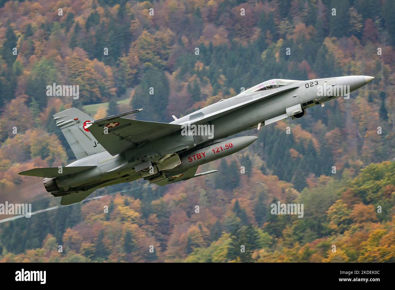 A McDonnell Douglas F/A-18 Hornet supersonic multirole combat aircraft of the Swiss Air Force at the Swiss Alps. Stock Photo