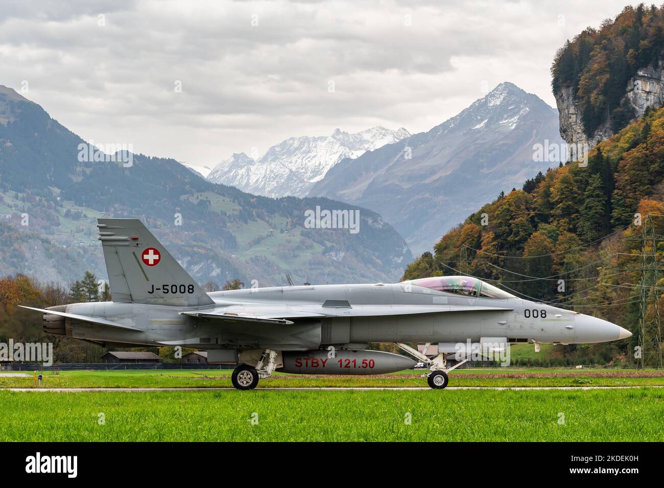 A McDonnell Douglas F/A-18 Hornet supersonic multirole combat aircraft of the Swiss Air Force at the Swiss Alps. Stock Photo