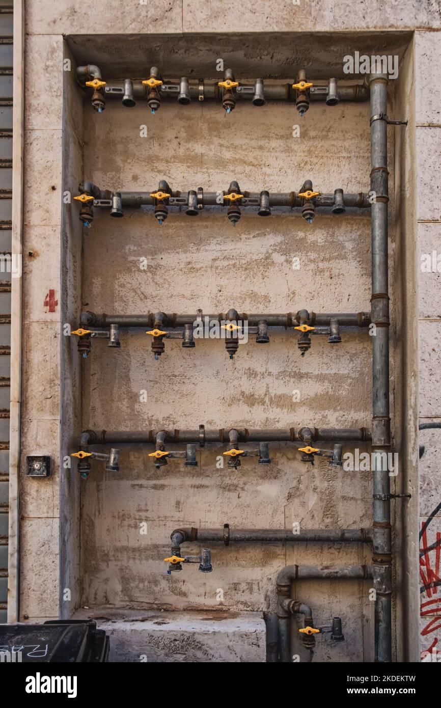 Urban gas taps in the streets of Trapani, Sicily Stock Photo