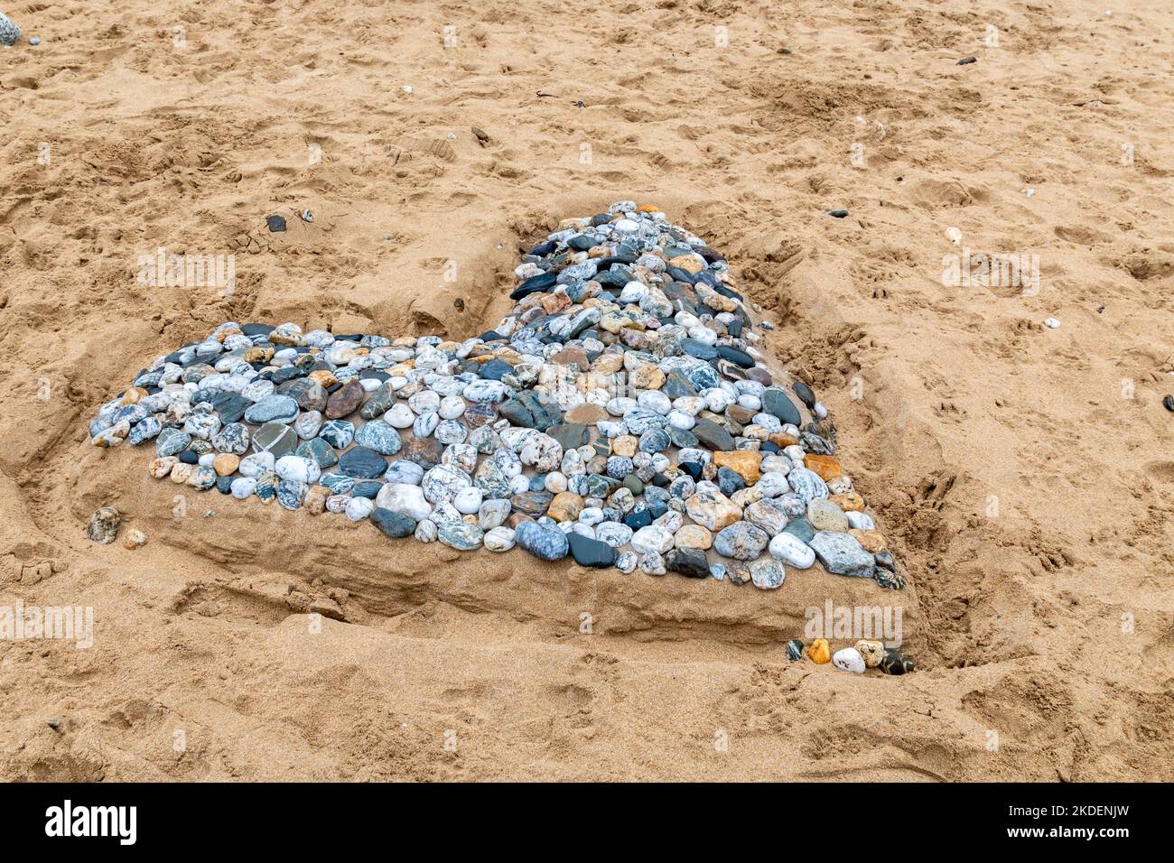 A heart made from pebbles found on Fistral Beach in Cornwall, UK Stock Photo