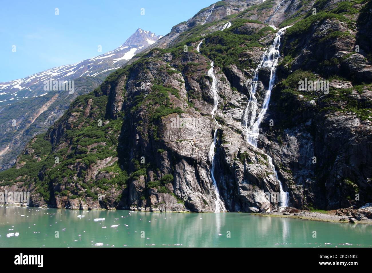 Waterfall in the Tracy Arm inlet in the Boundary Ranges of Alaska, United States Stock Photo