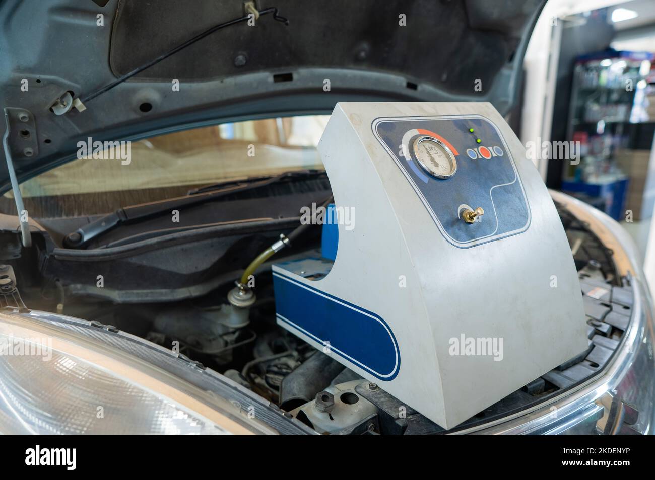 Automated change of brake fluid in a car service. Car Stock