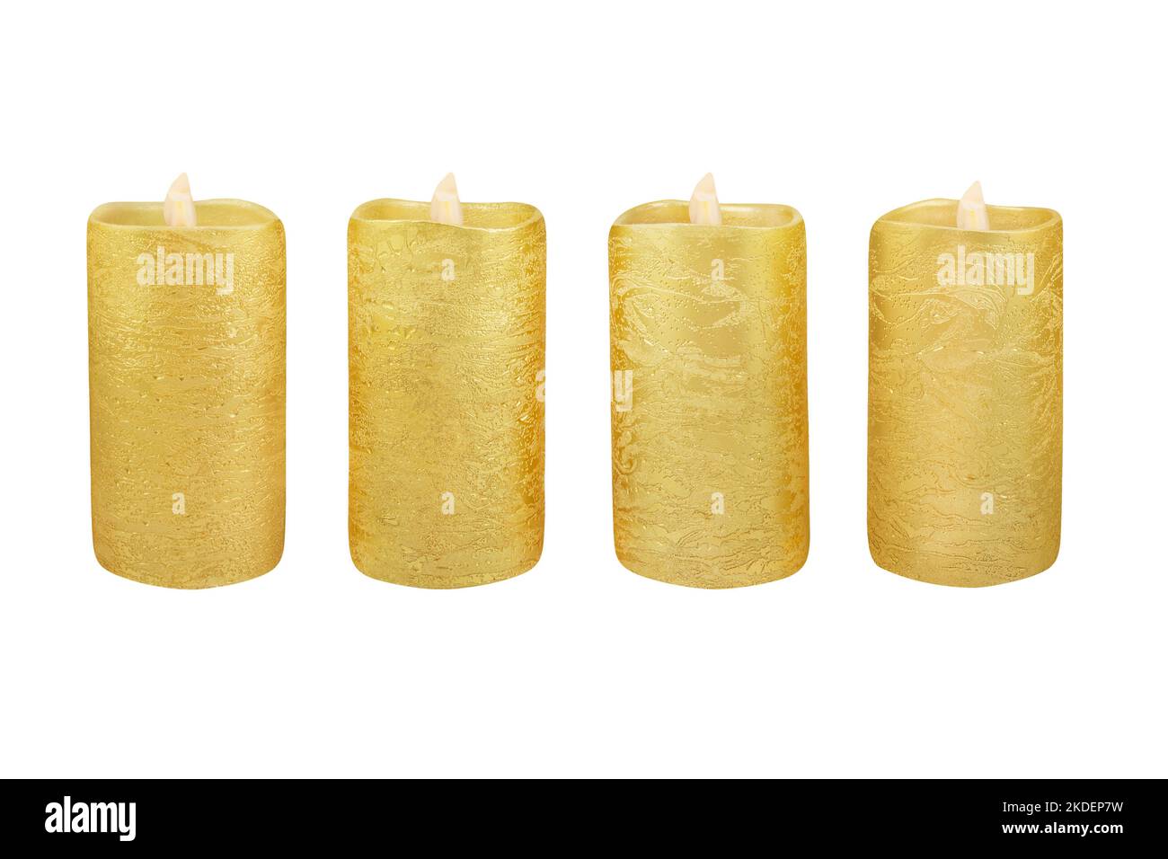 Four golden vintage LED real wax candles isolated on white background Stock Photo