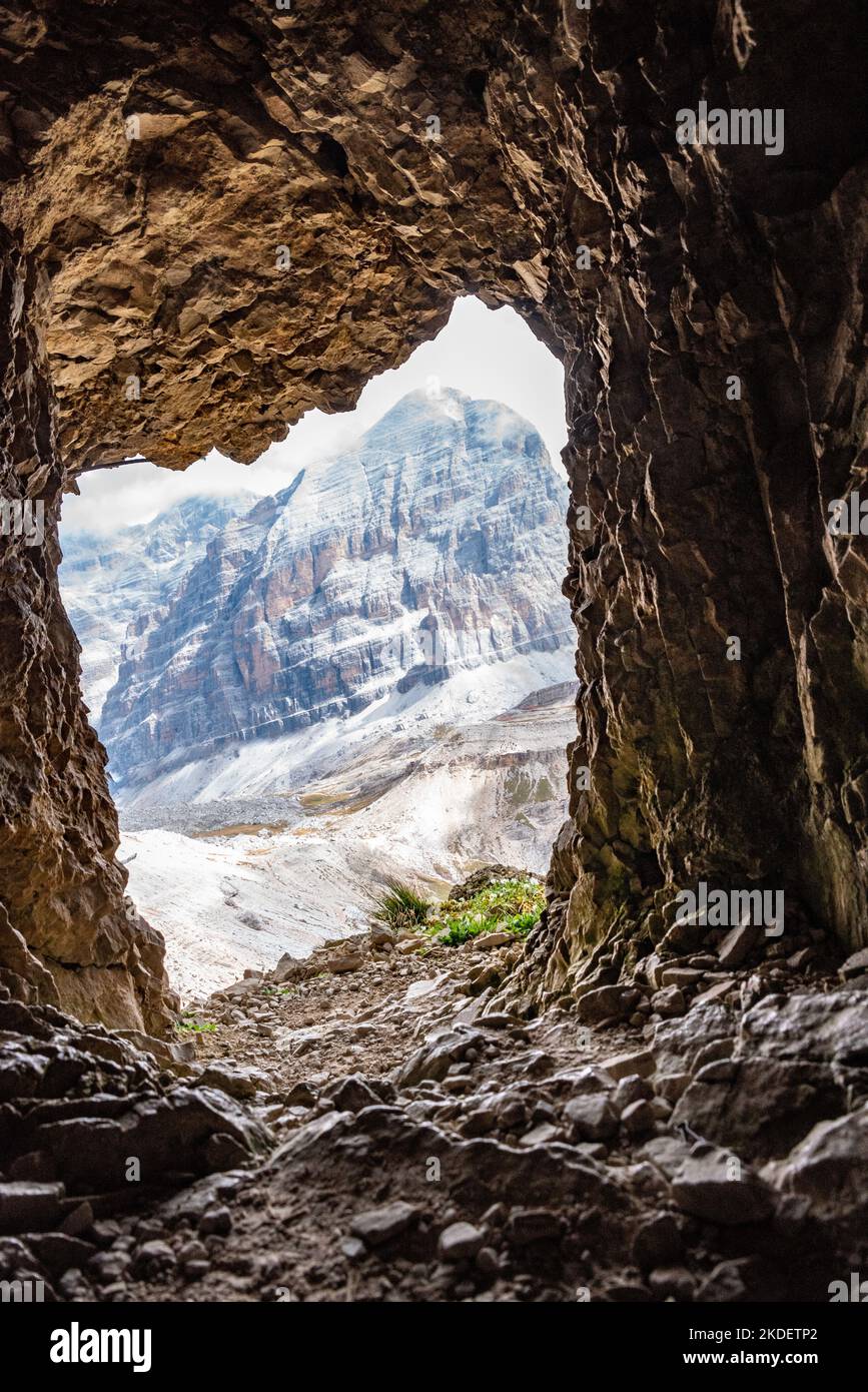 View out of a loophole of the Mount Lagazuoi tunnels, built during the First World War, the Dolomite Alps in South Tirol Stock Photo