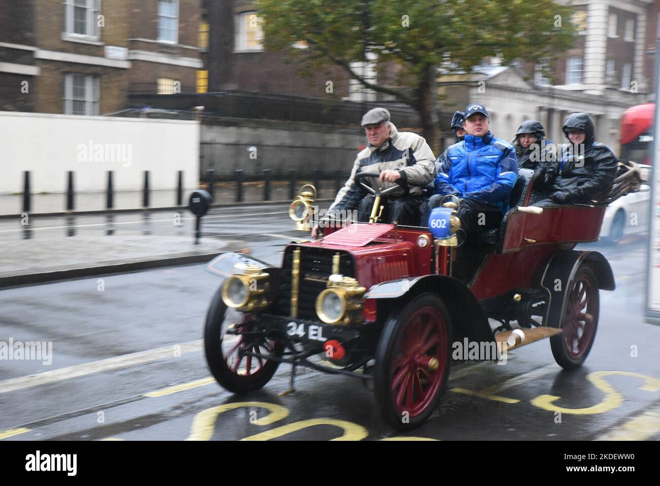 London, UK. 06th Nov, 2022. - [ ] Participants in the annual London to Brighton veteran car run have been faced with torrential rain. Many of the an kent vehicles are open top and the passengers are having done wet weather gear. Several did not make it out of Whitehall where a sudden heavy shower has left The road running like a river rather than a road. Vehicles are having to slow down a swerve to avoid the deep puddles. Credit: graham mitchell/Alamy Live News Credit: graham mitchell/Alamy Live News Stock Photo