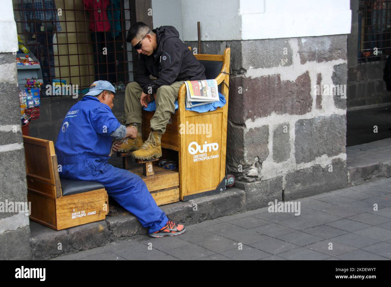 Shoe shine working Quito, Ecuador Stock Photo