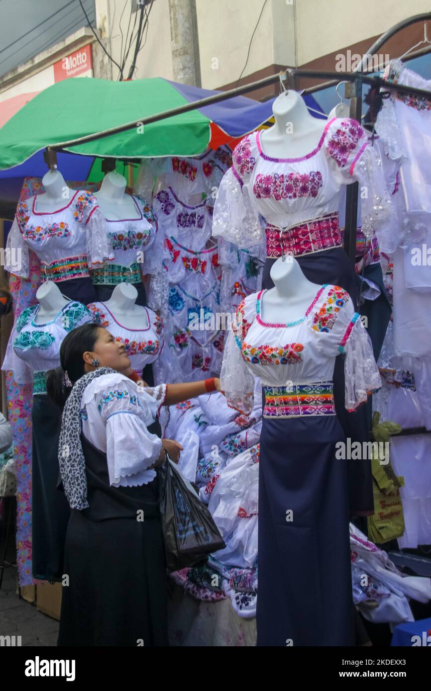 embroidered Shirts at Traditional handicraft market at Otavalo, Imbabura Province, Ecuador. Stock Photo