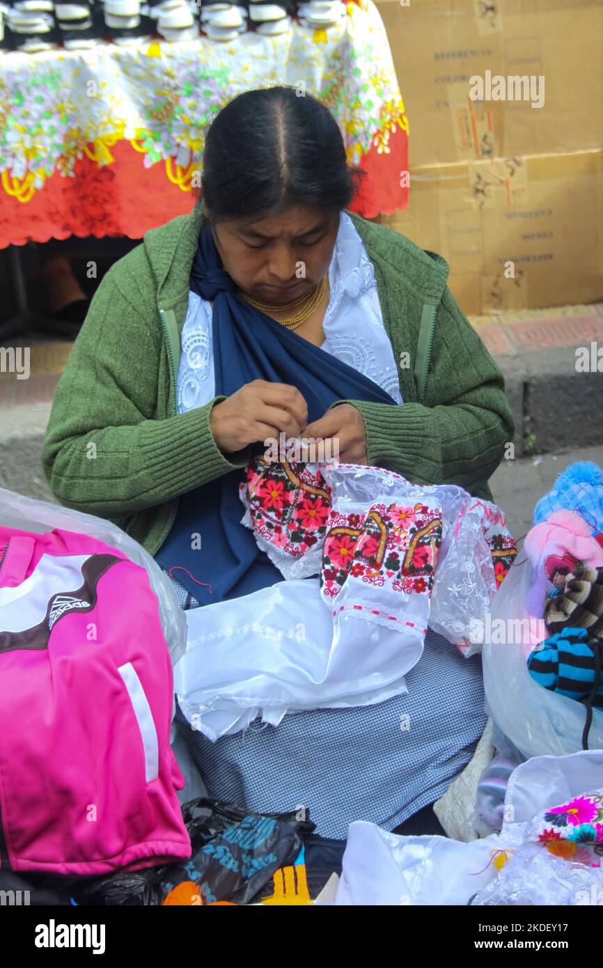 embroidered Shirts at Traditional handicraft market at Otavalo, Imbabura Province, Ecuador. Stock Photo