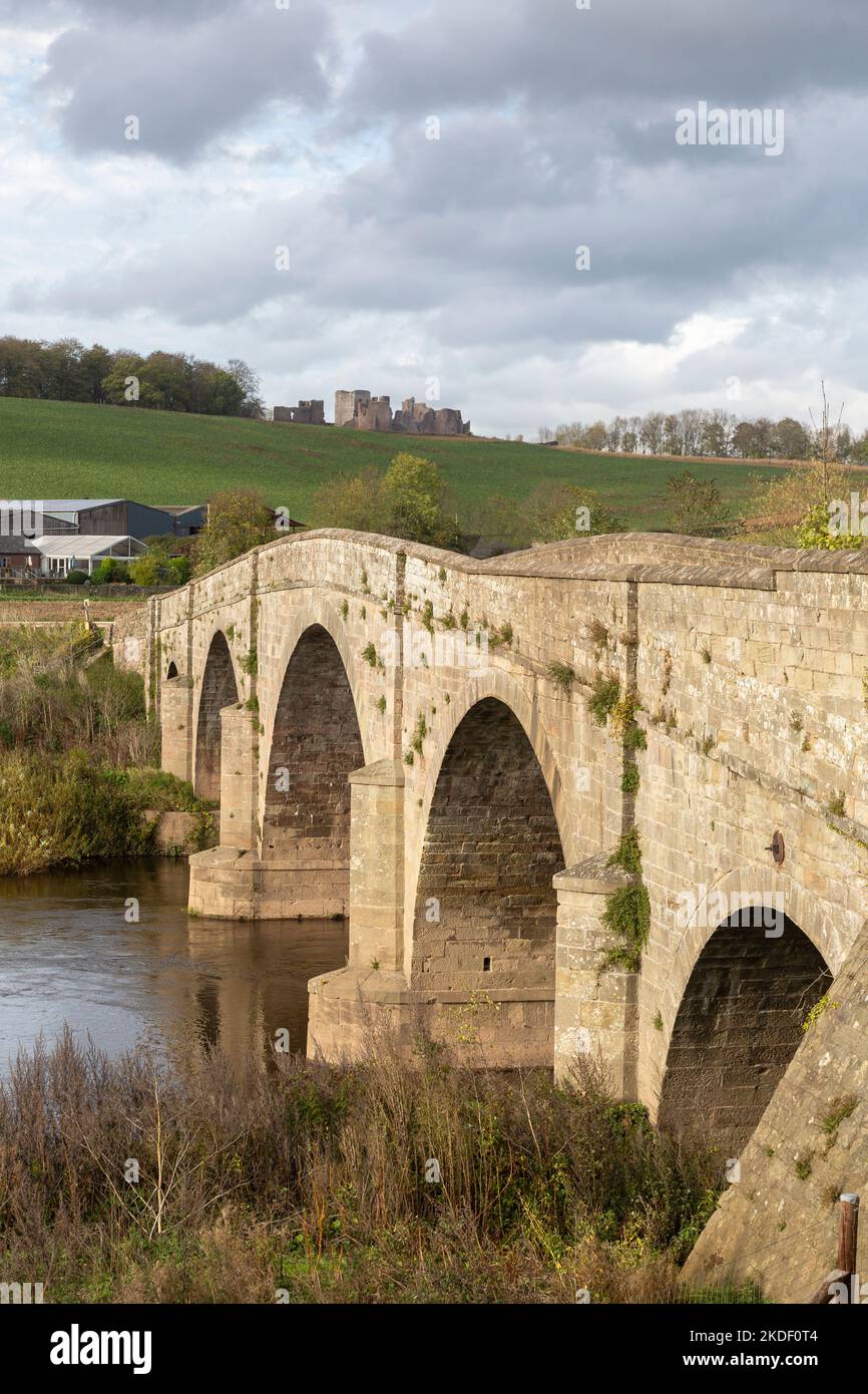 Kerne Bridge on the River Wye in Herefordshire, England.  Built 1825-28. A scheduled monument. Goodrich Castle is on the horizon. Stock Photo