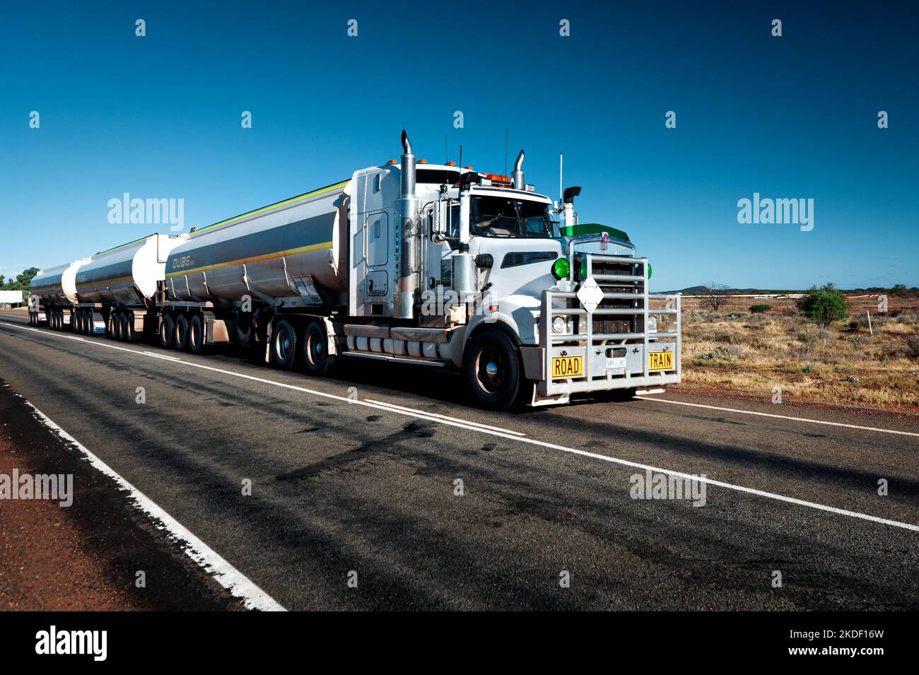 Road Train on an outback highway. Stock Photo