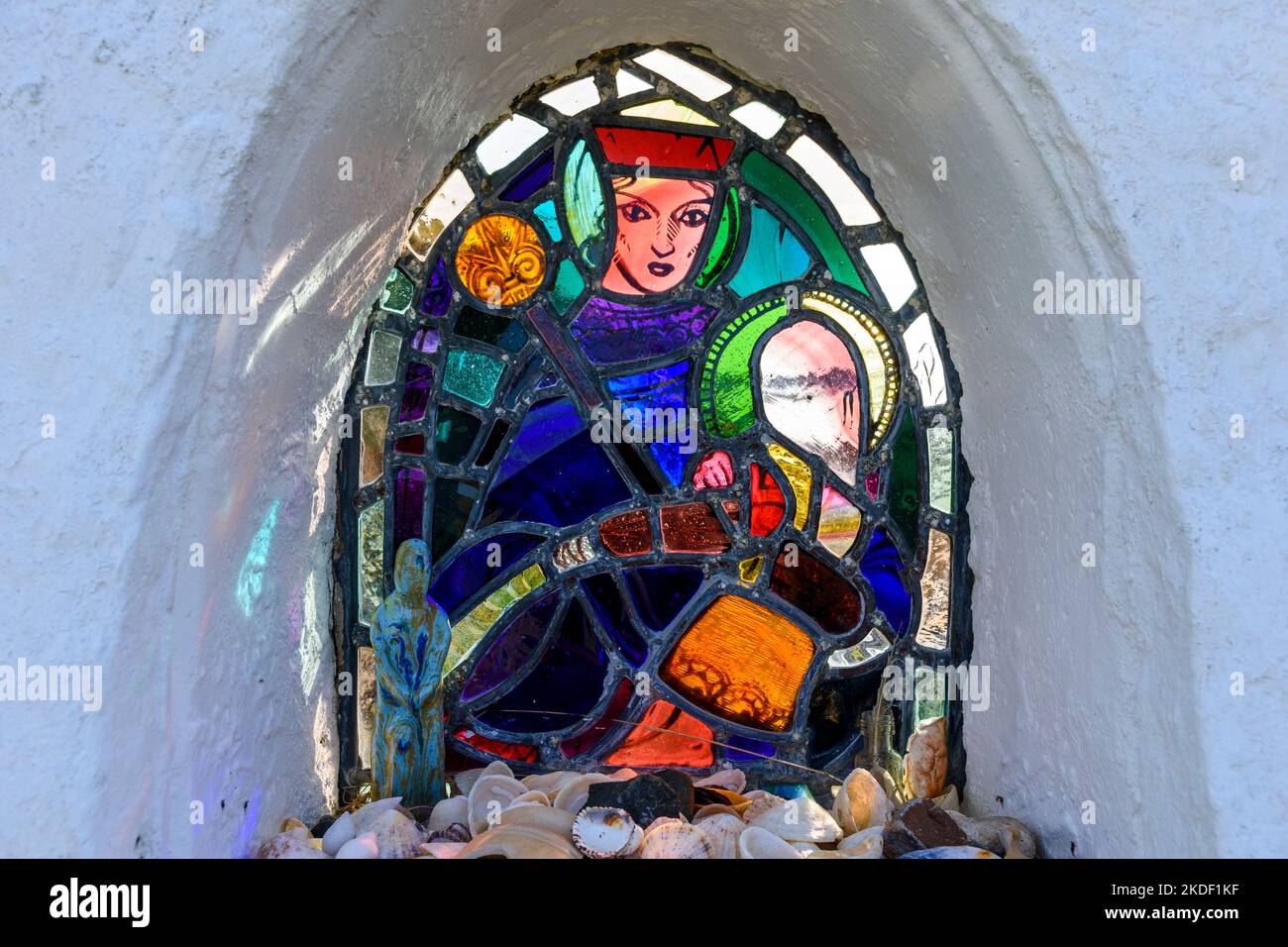 Stained glass in the Marian shrine at the Sanday-Canna bridge.  Isle of Sanday, Scotland, UK Stock Photo