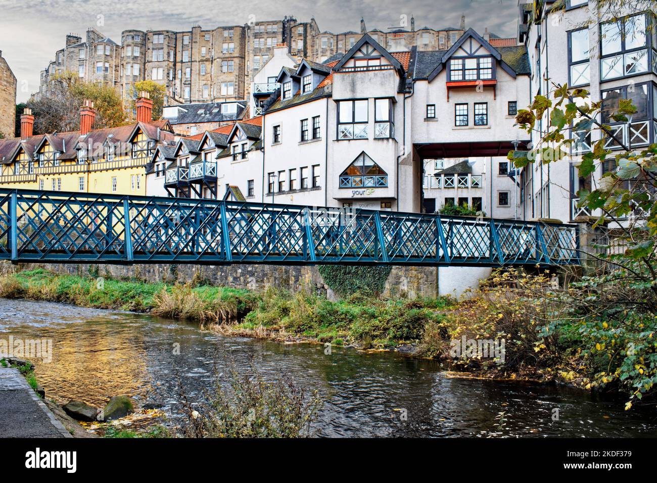 Edinburgh Scotland Dean Village houses and iron bridge over the Water