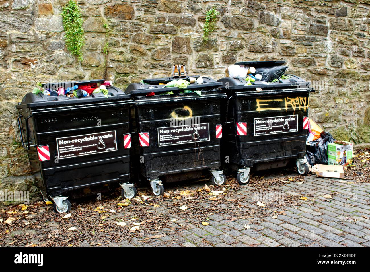 Edinburgh Scotland Dean Village three rubbish bins full of non