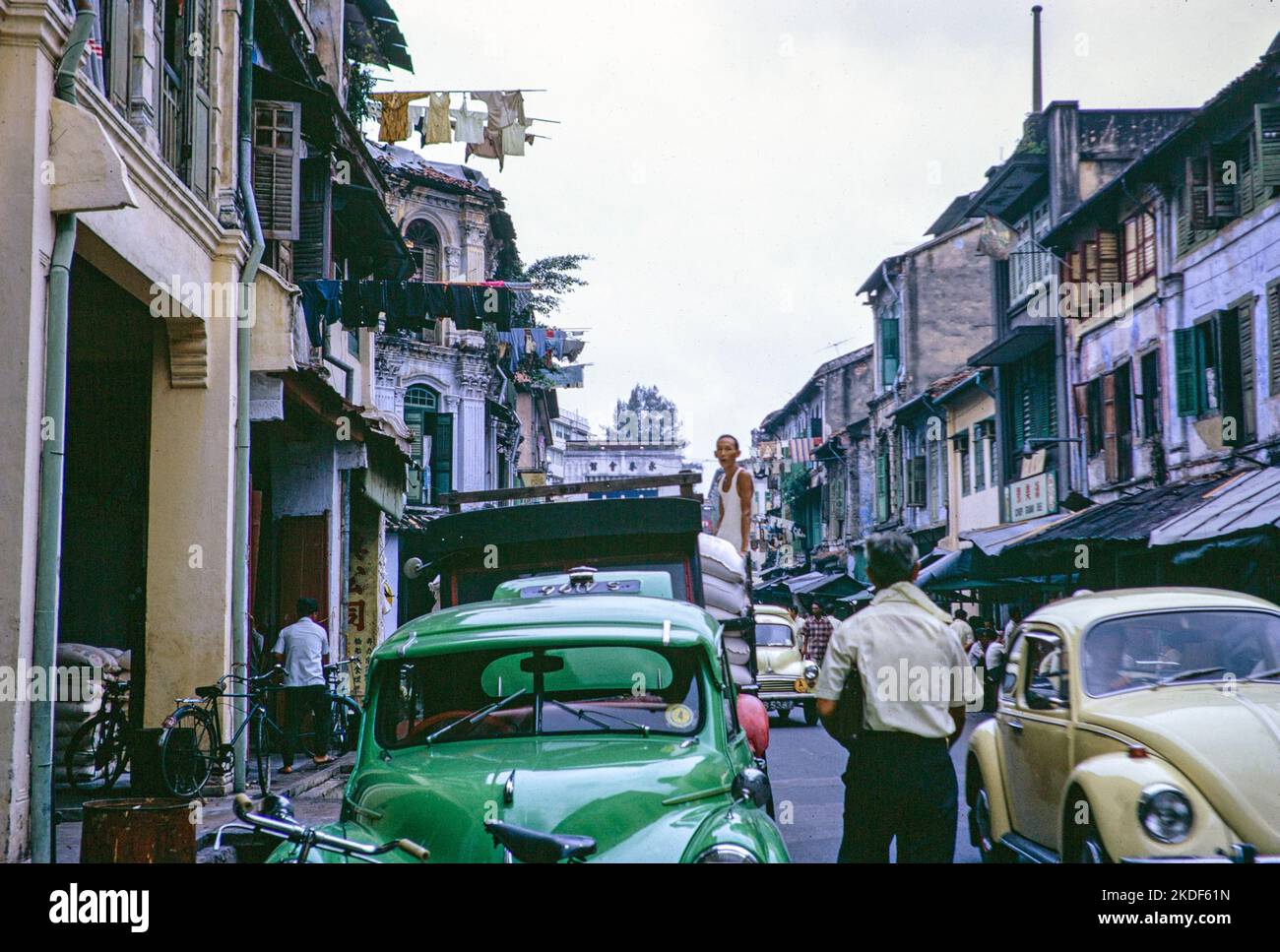People and traffic in street of downtown Chinese area, Singapore, Asia 1970 Stock Photo